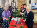 Members of the MU made up bunches of daffodils to hand out on 15th March - Mothering Sunday.