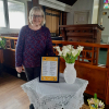 Beth sorted out the lilies given in memory of loved ones.